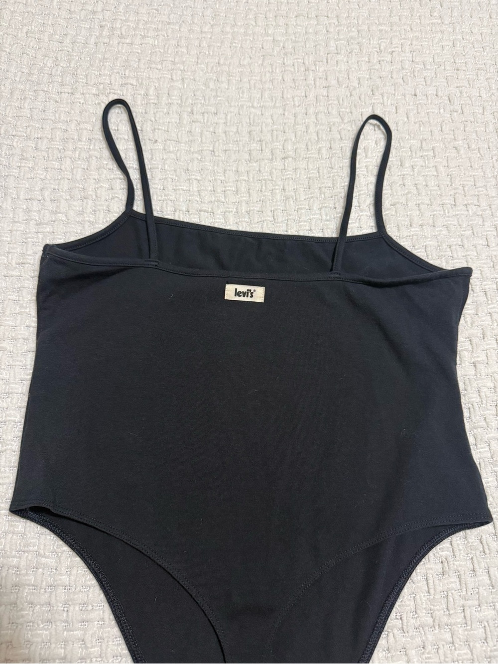 Levi’s women’s black body suit, medium. Excellent condition